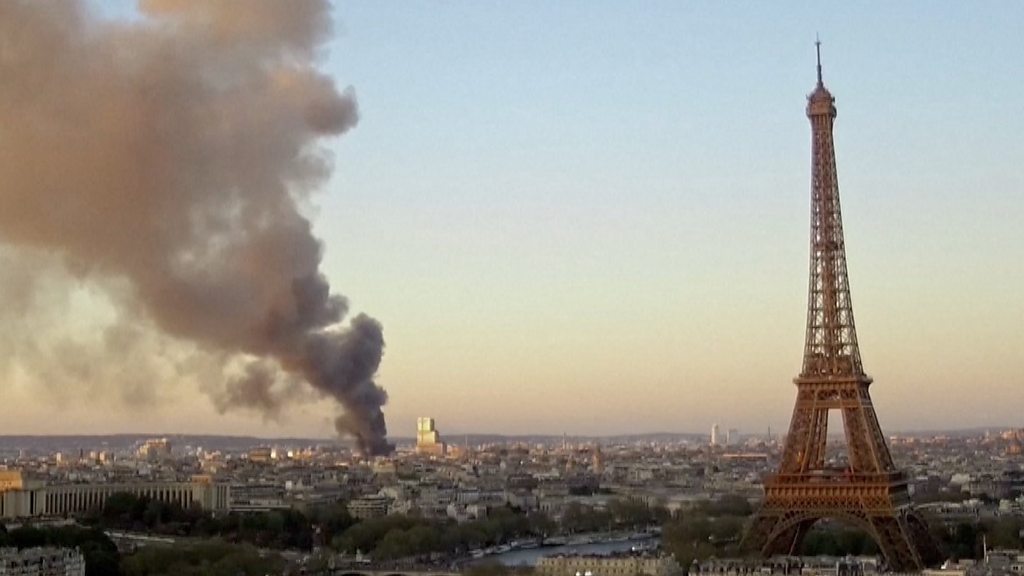 Plume of black smoke over Parisian skyline after 'major' fire